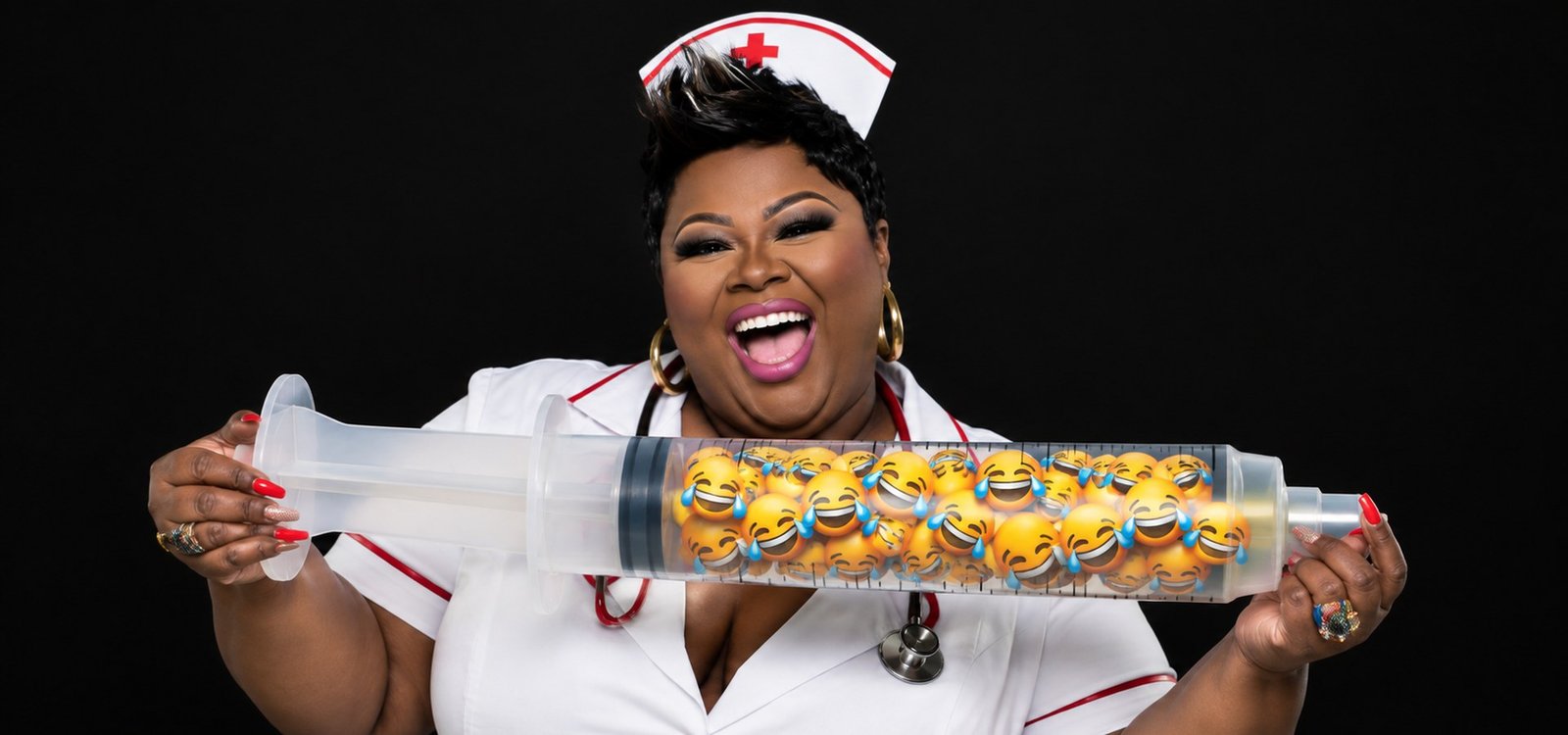 Tanya Lewis in a nurse uniform holding an oversized syringe filled with laughing faces